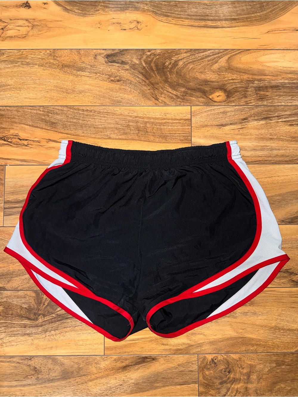 Nike Black Women's Athletic Shorts with Red Trim